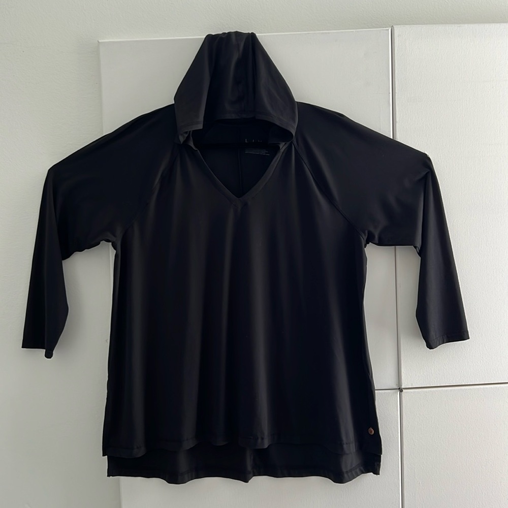 23. Livi Active, lightweight tunic, v neck, long sleeves, high low hem and hood.